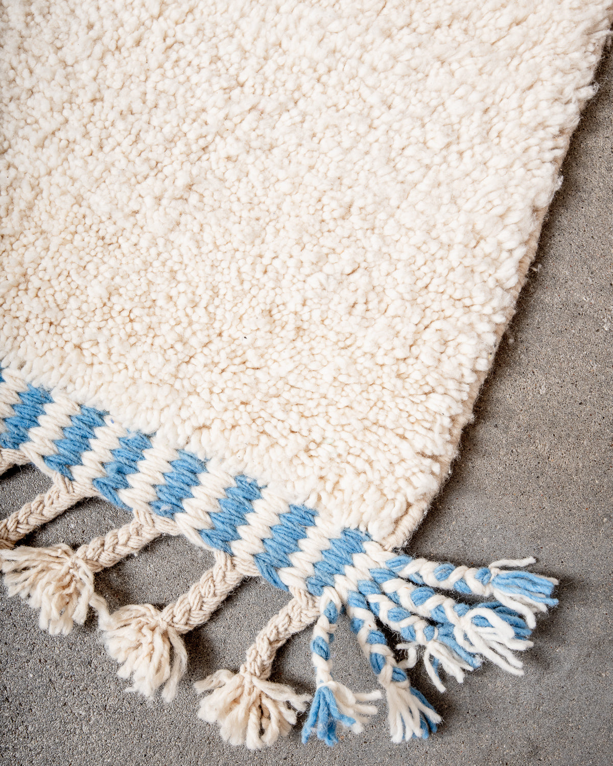 Modern, designer, handcrafted Berber rug from Morocco. Beniourain carpet with beautiful colours and patterns and fluffy wool texture.